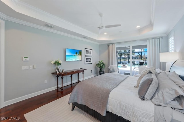 9052 Graphite Cir, Naples, FL 34120 - bedroom with a raised ceiling, wood finished floors, ornamental molding, recessed lighting, and baseboards