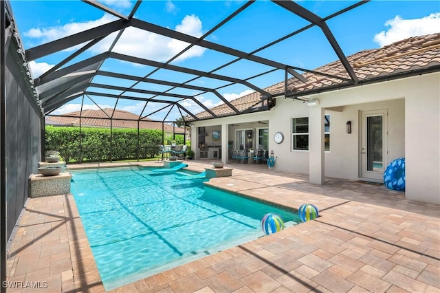 9052 Graphite Cir, Naples, FL 34120 - swimming pool with a patio area, ceiling fan, and a lanai