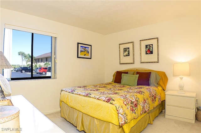 7116 Lakeridge Ct Unit 103, Fort Myers, FL 33907 - bedroom featuring light colored carpet