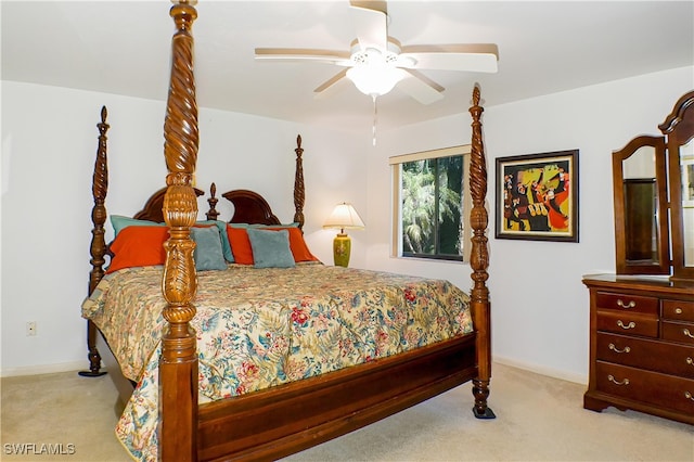 7116 Lakeridge Ct Unit 103, Fort Myers, FL 33907 - bedroom featuring light colored carpet, a ceiling fan, and baseboards
