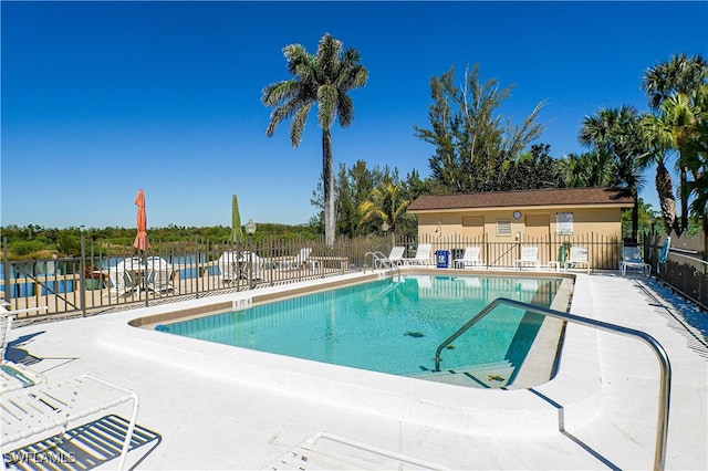 7116 Lakeridge Ct Unit 103, Fort Myers, FL 33907 - pool featuring a patio area and fence