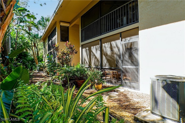 7116 Lakeridge Ct Unit 103, Fort Myers, FL 33907 - view of home's exterior featuring stucco siding and central AC