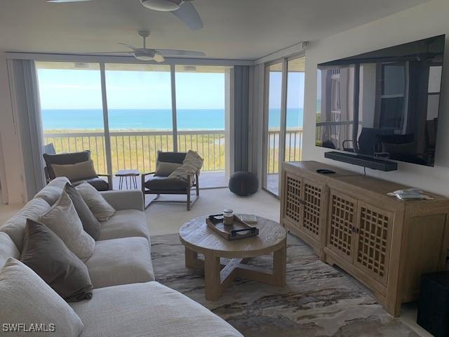 living room featuring ceiling fan