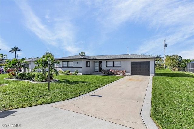 ranch-style house with stucco siding, a front yard, concrete driveway, and an attached garage