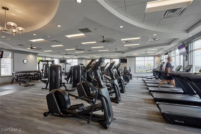 gym featuring visible vents, carpet, and a drop ceiling