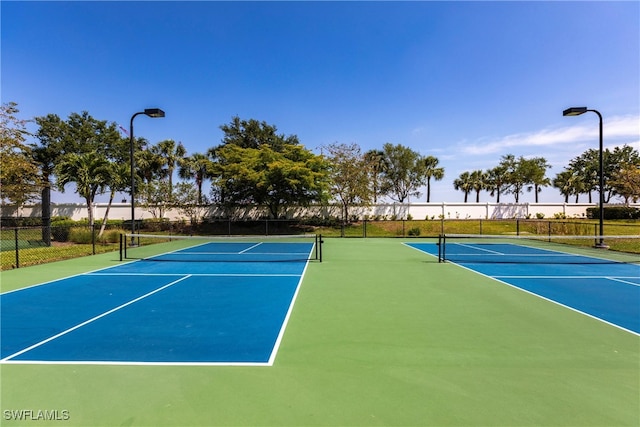 view of sport court with fence and community basketball court