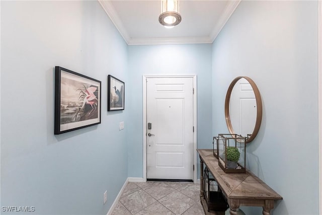 doorway to outside featuring baseboards and ornamental molding