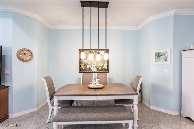 dining area with light tile patterned flooring, baseboards, and ornamental molding