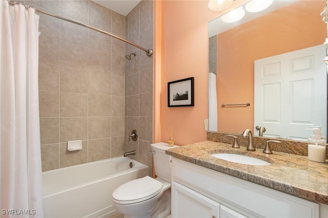 full bath with shower / bath combo with shower curtain, toilet, and vanity