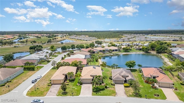 aerial view with a water view and a residential view