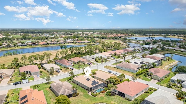 aerial view with a residential view and a water view