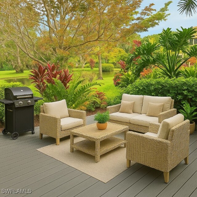 428 Meadowlark Ln Unit A, Naples, FL 34105 - wooden deck featuring outdoor lounge area and a grill