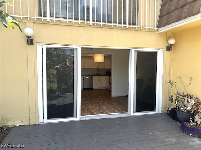428 Meadowlark Ln Unit A, Naples, FL 34105 - entrance to property featuring a sink, a deck, and stucco siding