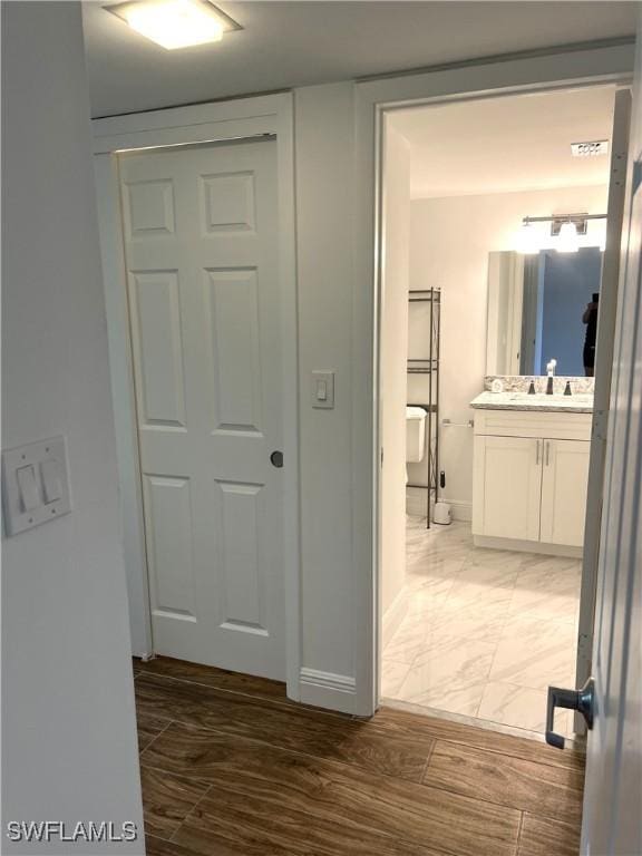 428 Meadowlark Ln Unit A, Naples, FL 34105 - hall featuring baseboards and visible vents