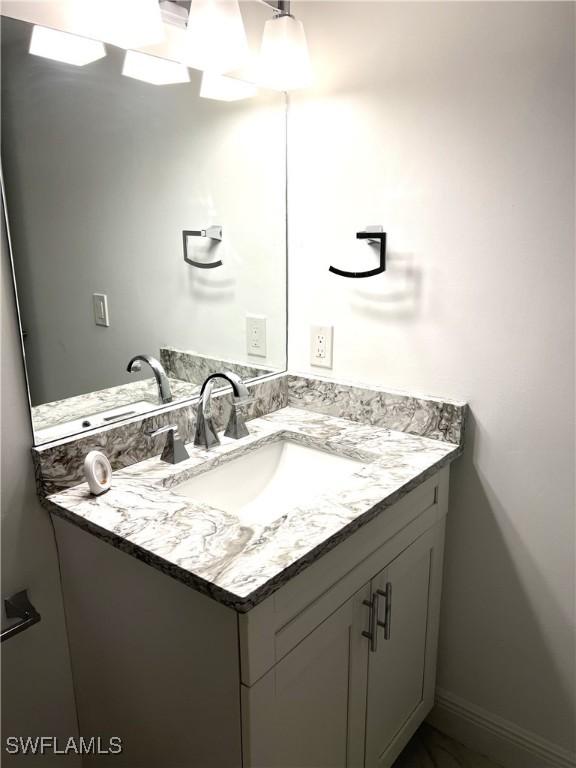 428 Meadowlark Ln Unit A, Naples, FL 34105 - bathroom featuring vanity