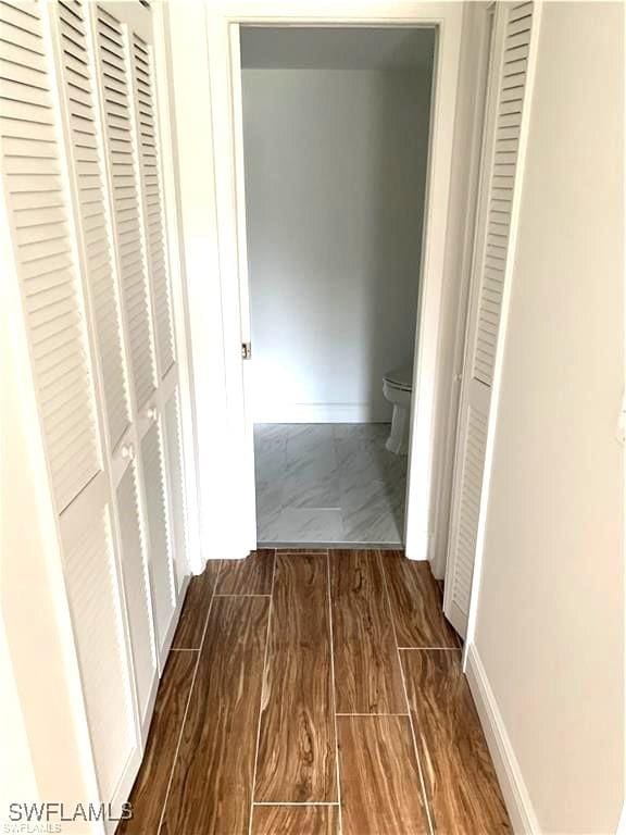 428 Meadowlark Ln Unit A, Naples, FL 34105 - hall featuring baseboards