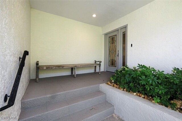 16591 Waters Edge Ct, Fort Myers, FL 33908 - entrance to property with stucco siding