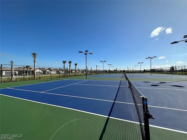 view of sport court with fence and community basketball court