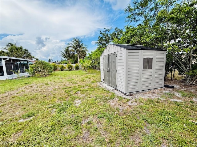 view of shed with a sunroom