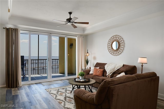 2743 1st St Unit 2001, Fort Myers, FL 33916 - living area featuring a water view, ceiling fan, wood finished floors, and a raised ceiling