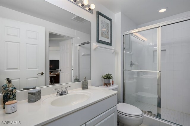 2743 1st St Unit 2001, Fort Myers, FL 33916 - bathroom with vanity, recessed lighting, a stall shower, and toilet