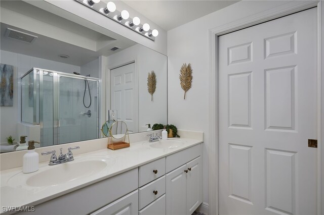 2743 1st St Unit 2001, Fort Myers, FL 33916 - bathroom with visible vents, a sink, and a stall shower