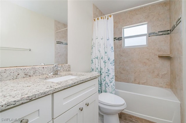 full bathroom with toilet, vanity, shower / bath combination with curtain, and wood finished floors