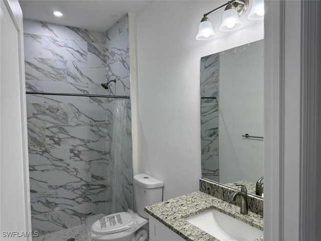 5249-5251 Centennial Blvd, Lehigh Acres, FL 33971 - full bathroom with toilet, vanity, and a marble finish shower