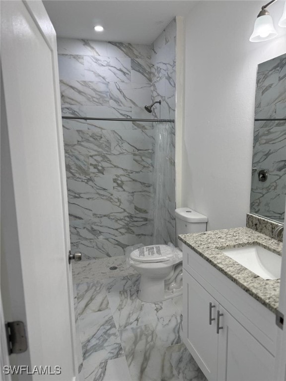 5249-5251 Centennial Blvd, Lehigh Acres, FL 33971 - bathroom with marble look tile flooring, toilet, a marble finish shower, vanity, and recessed lighting