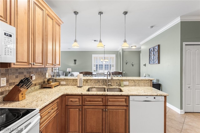 kitchen with decorative backsplash, a peninsula, white appliances, a sink, and light tile patterned floors