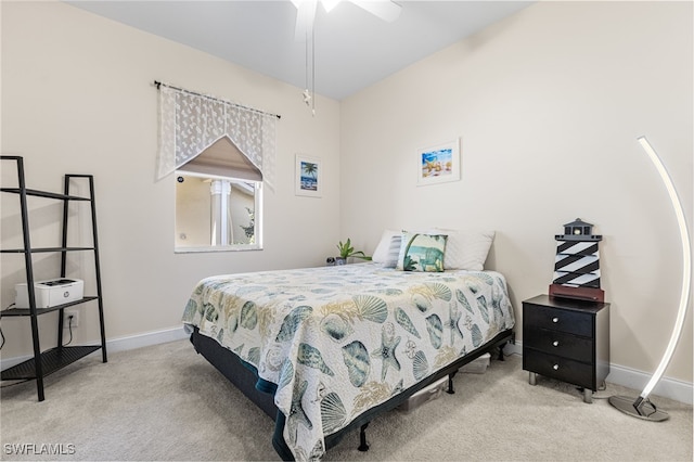 bedroom with carpet floors, baseboards, and ceiling fan