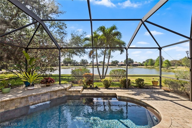 pool featuring a lanai, a water view, and a patio