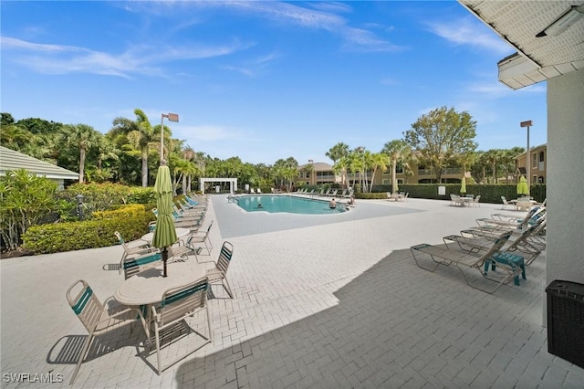 23125 Marsh Landing Blvd, Estero, FL 33928 - community pool with a patio area