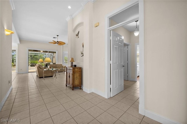 23125 Marsh Landing Blvd, Estero, FL 33928 - hall featuring light tile patterned floors, baseboards, and crown molding