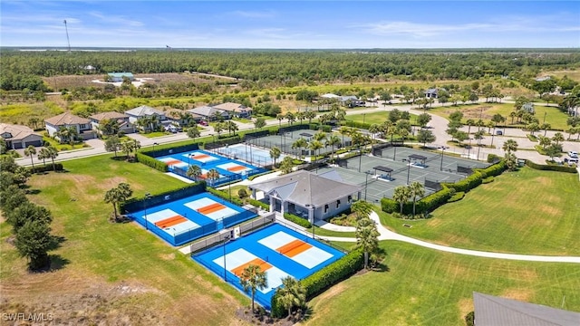 birds eye view of property with a residential view