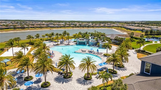 pool featuring a water view and a residential view