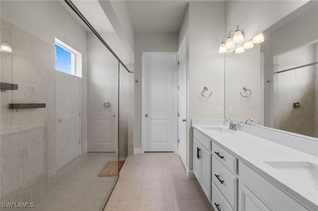3419 Pilot Cir, Naples, FL 34120 - full bathroom featuring double vanity, tiled shower, and a sink