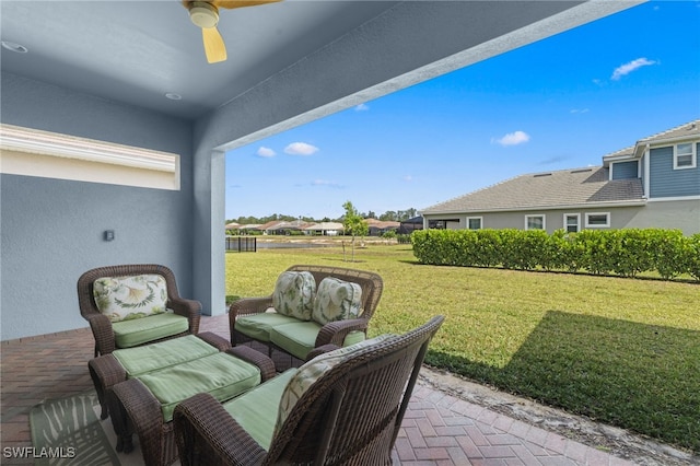 3419 Pilot Cir, Naples, FL 34120 - view of patio / terrace with a ceiling fan, outdoor lounge area, and a residential view