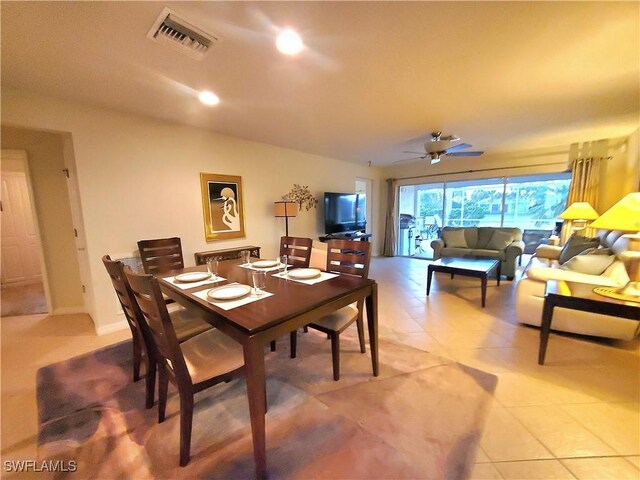 8657 Querce Ct, Naples, FL 34114 - dining room with light tile patterned floors, a ceiling fan, and recessed lighting