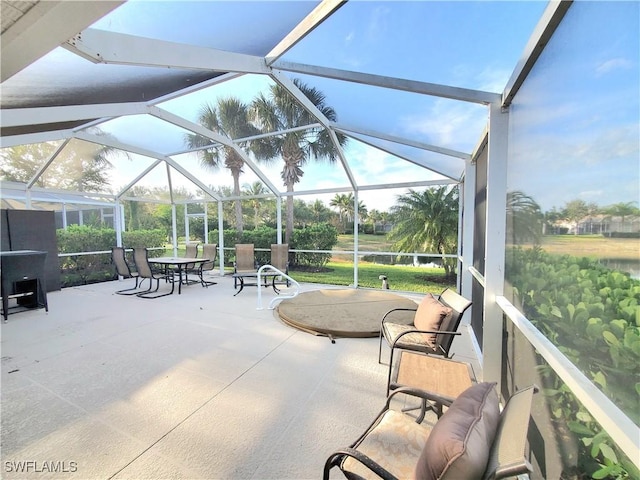 8657 Querce Ct, Naples, FL 34114 - view of patio featuring a lanai