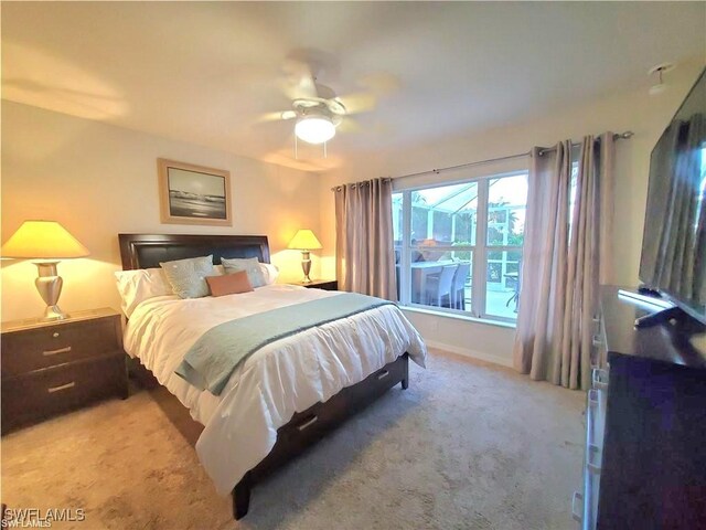 8657 Querce Ct, Naples, FL 34114 - bedroom with light carpet, baseboards, and ceiling fan