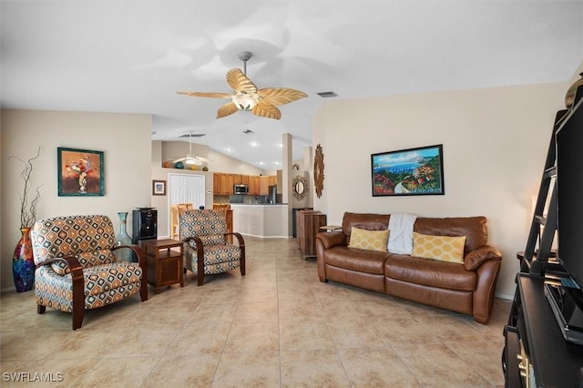 living area with visible vents, a ceiling fan, light tile patterned flooring, and lofted ceiling