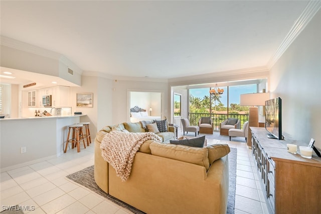 6549 Marissa Loop Unit 26, Naples, FL 34108 - living room featuring light tile patterned floors, ornamental molding, visible vents, and a notable chandelier