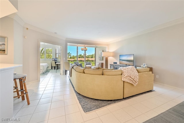 6549 Marissa Loop Unit 26, Naples, FL 34108 - living area featuring crown molding, baseboards, light tile patterned flooring, and a chandelier
