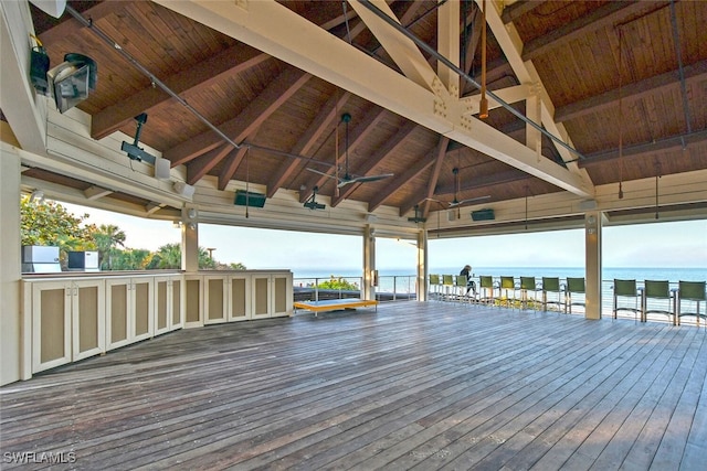 6549 Marissa Loop Unit 26, Naples, FL 34108 - wooden deck featuring a gazebo, a ceiling fan, and a water view