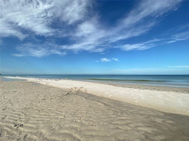6549 Marissa Loop Unit 26, Naples, FL 34108 - property view of water with a beach view