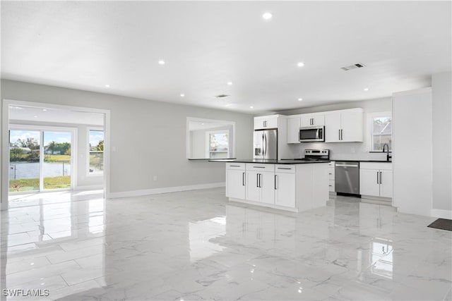 kitchen with recessed lighting, visible vents, appliances with stainless steel finishes, and a healthy amount of sunlight