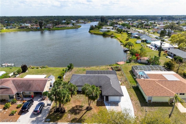 aerial view with a residential view and a water view