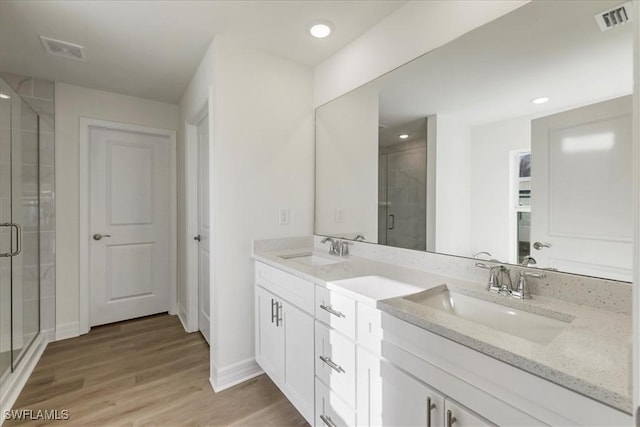 1904 NW 18th St, Cape Coral, FL 33993 - bathroom featuring visible vents, a sink, and a shower stall