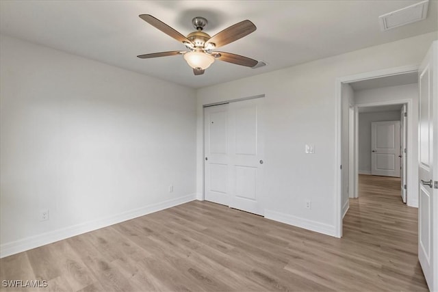 1904 NW 18th St, Cape Coral, FL 33993 - unfurnished bedroom with baseboards, a closet, light wood-type flooring, and visible vents